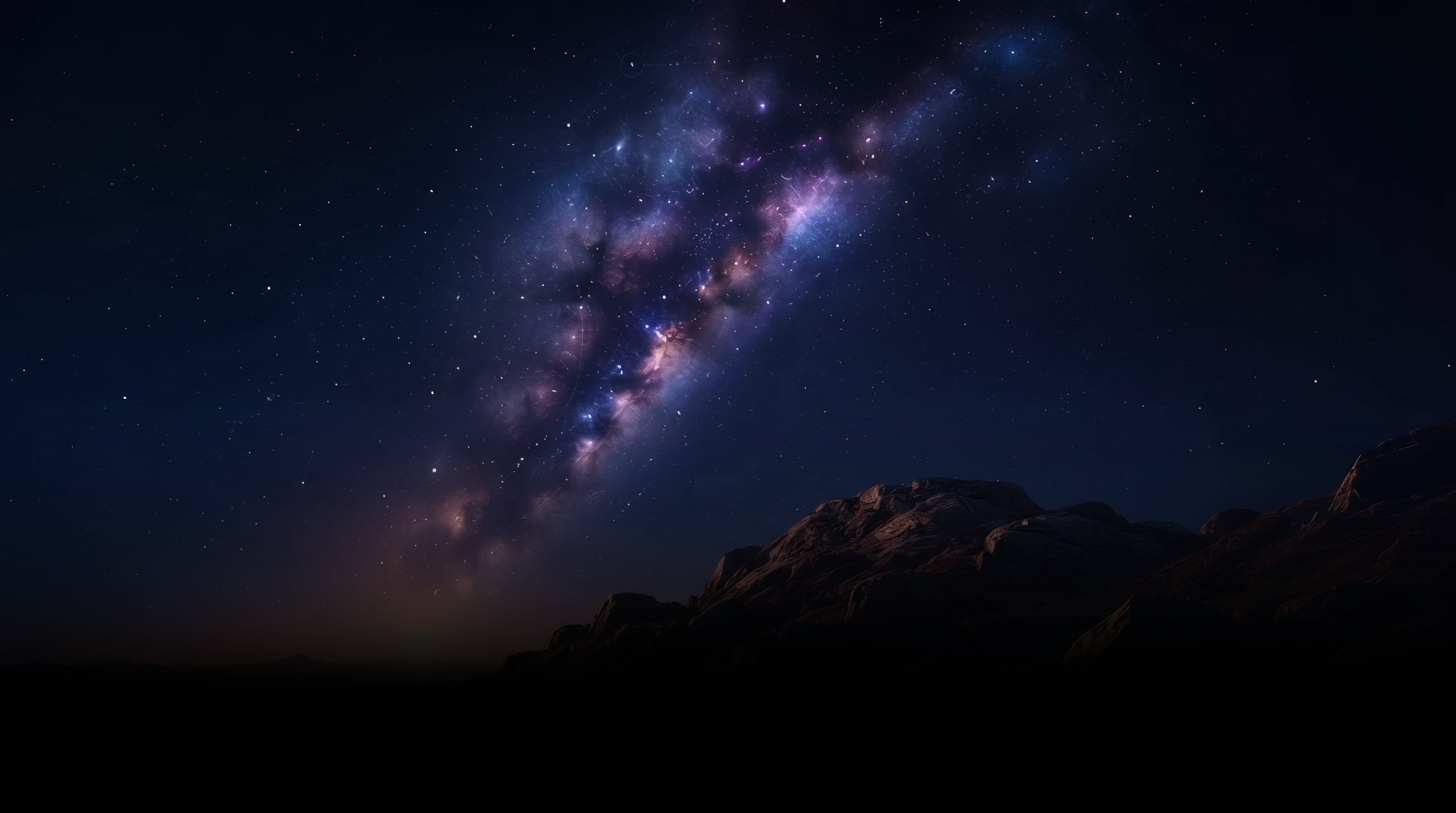 Night sky above a mountain observatory landscape